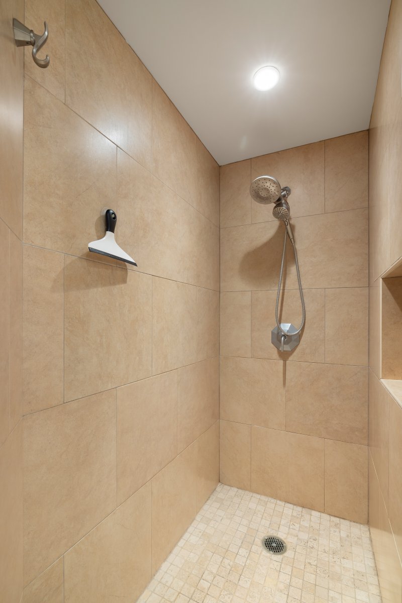 Walk-in shower in the primary bathroom.