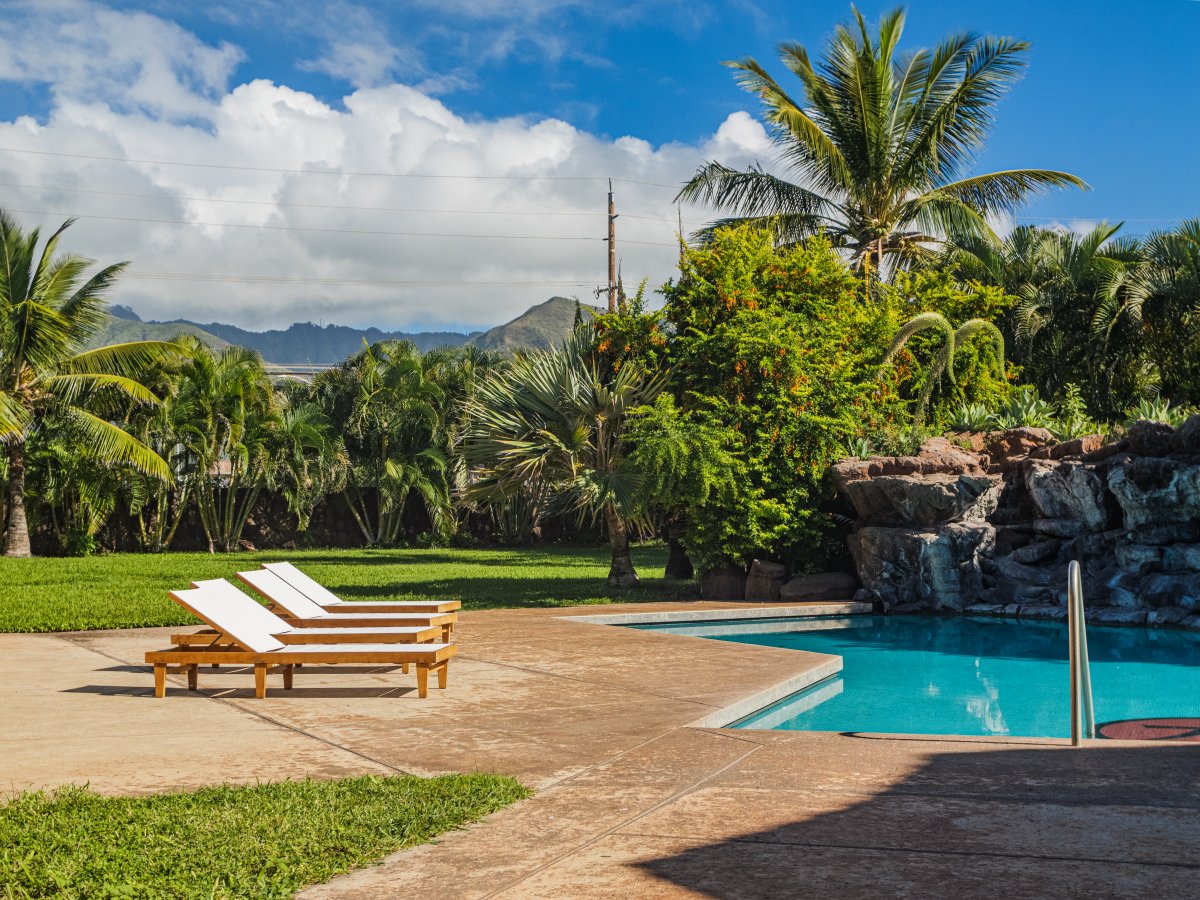 Poolside loungers for sunbathing.