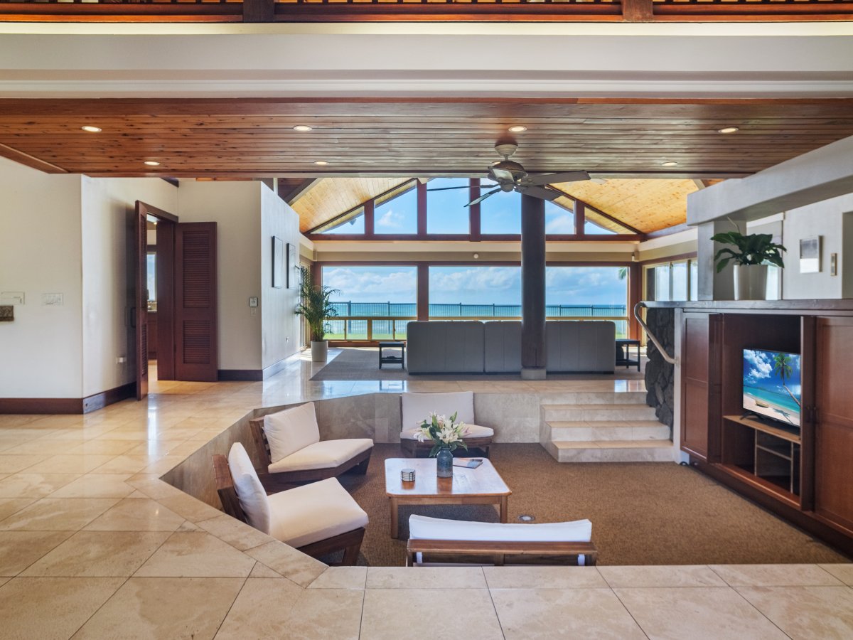 Dual living spaces with ocean view, perfect for relaxation and socializing.