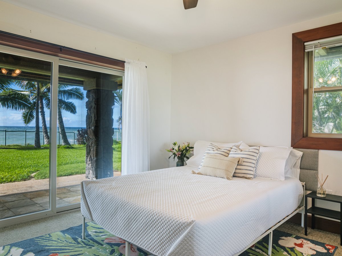 Guest suite with access to outdoors, a perfect spot to be greeted in the morning by nature.