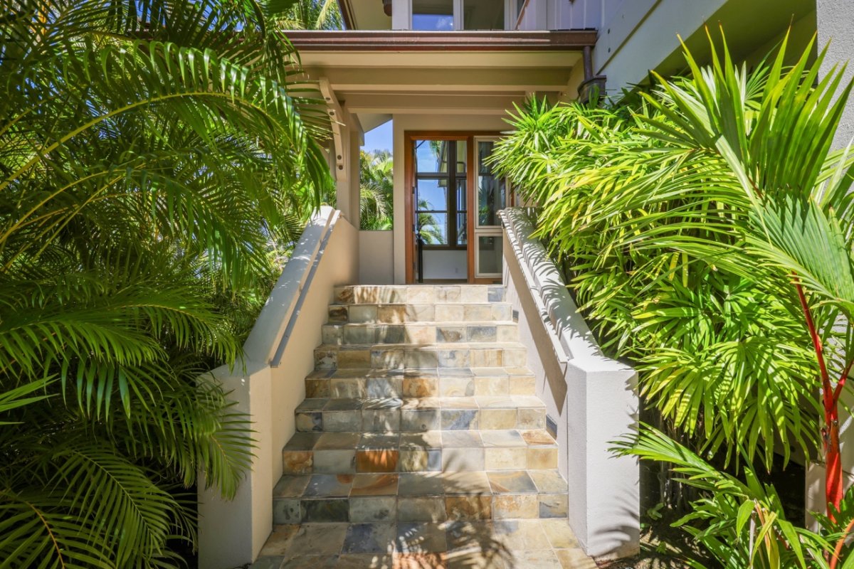 View of stairway leading to the front door.