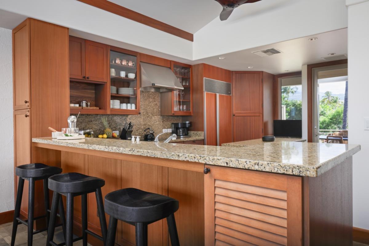 View of the kitchen from the bar seating.