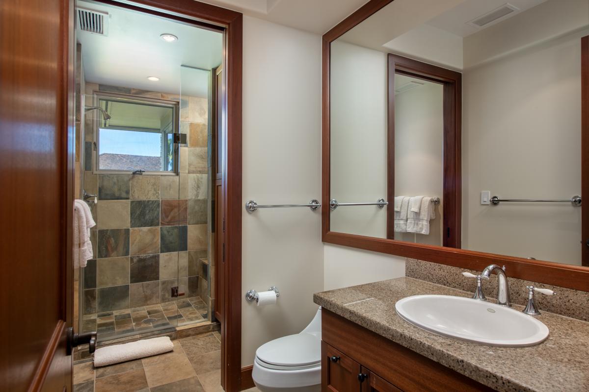 The ensuite bathroom with separate shower.