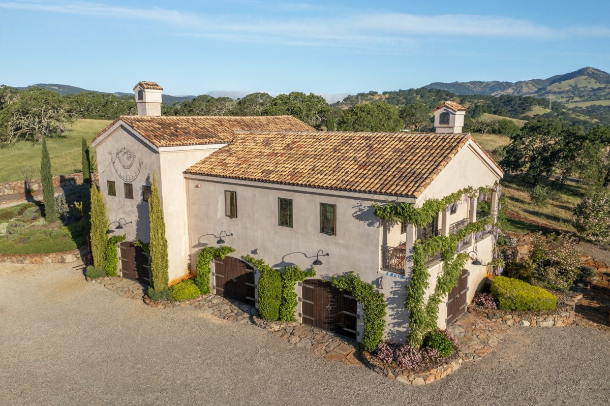 A 2-bedroom Guest House, equally beautiful, sits above the winery just a short walk away