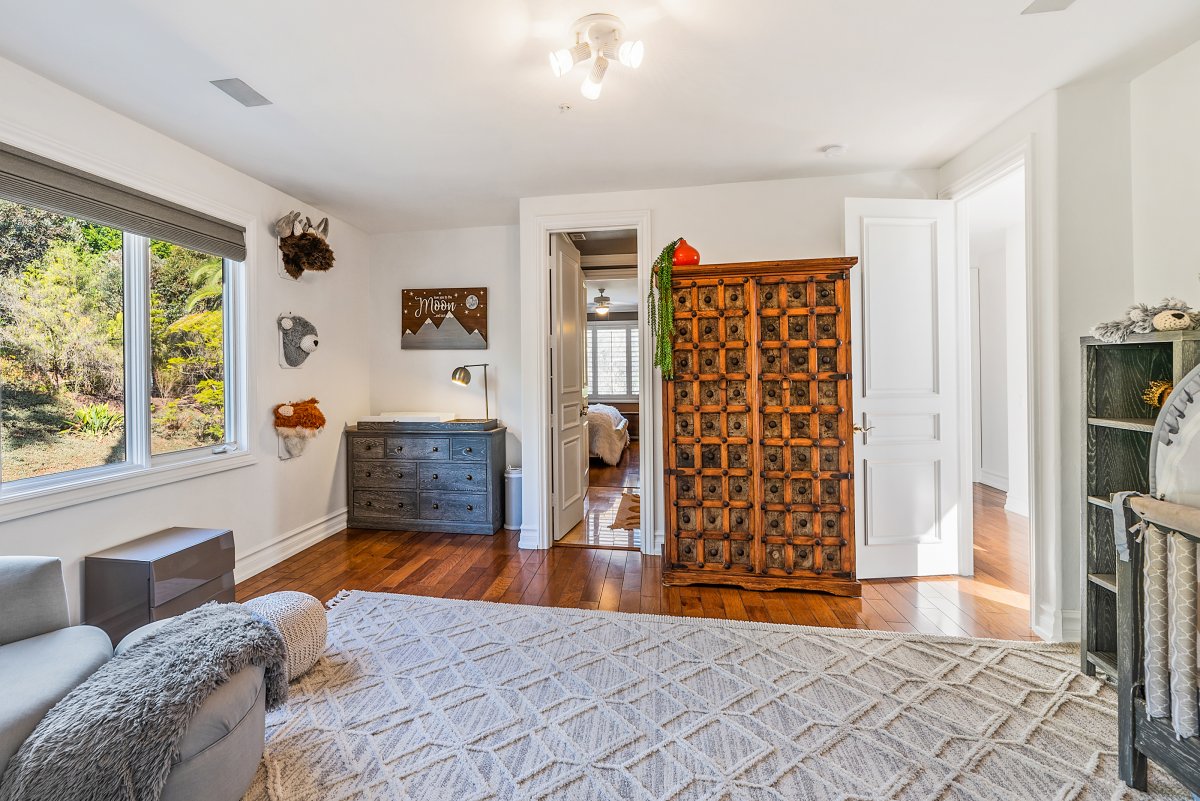 Informal living room connects to The Nursery, nicknamed "Worldliness Adventures".