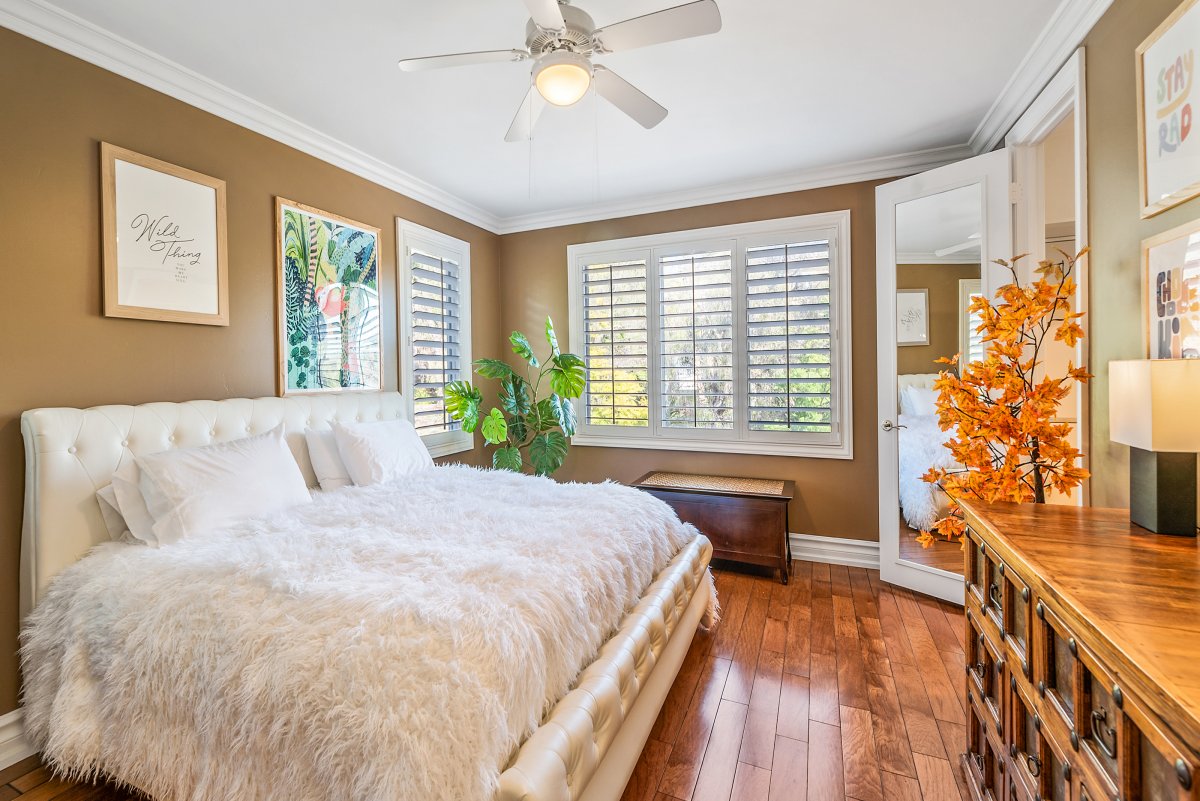 "The Inner Child" bedroom, with a king bed, and soft decor appealing to the comfort seeker in all of us.