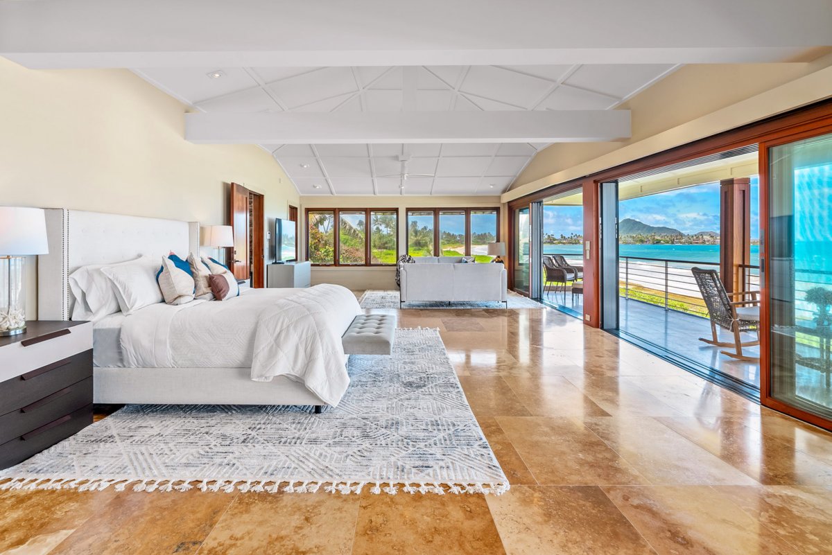 Enjoy the 1200 sq feet primary suite featuring a private lanai with oceanfront views, AC and lounge area.