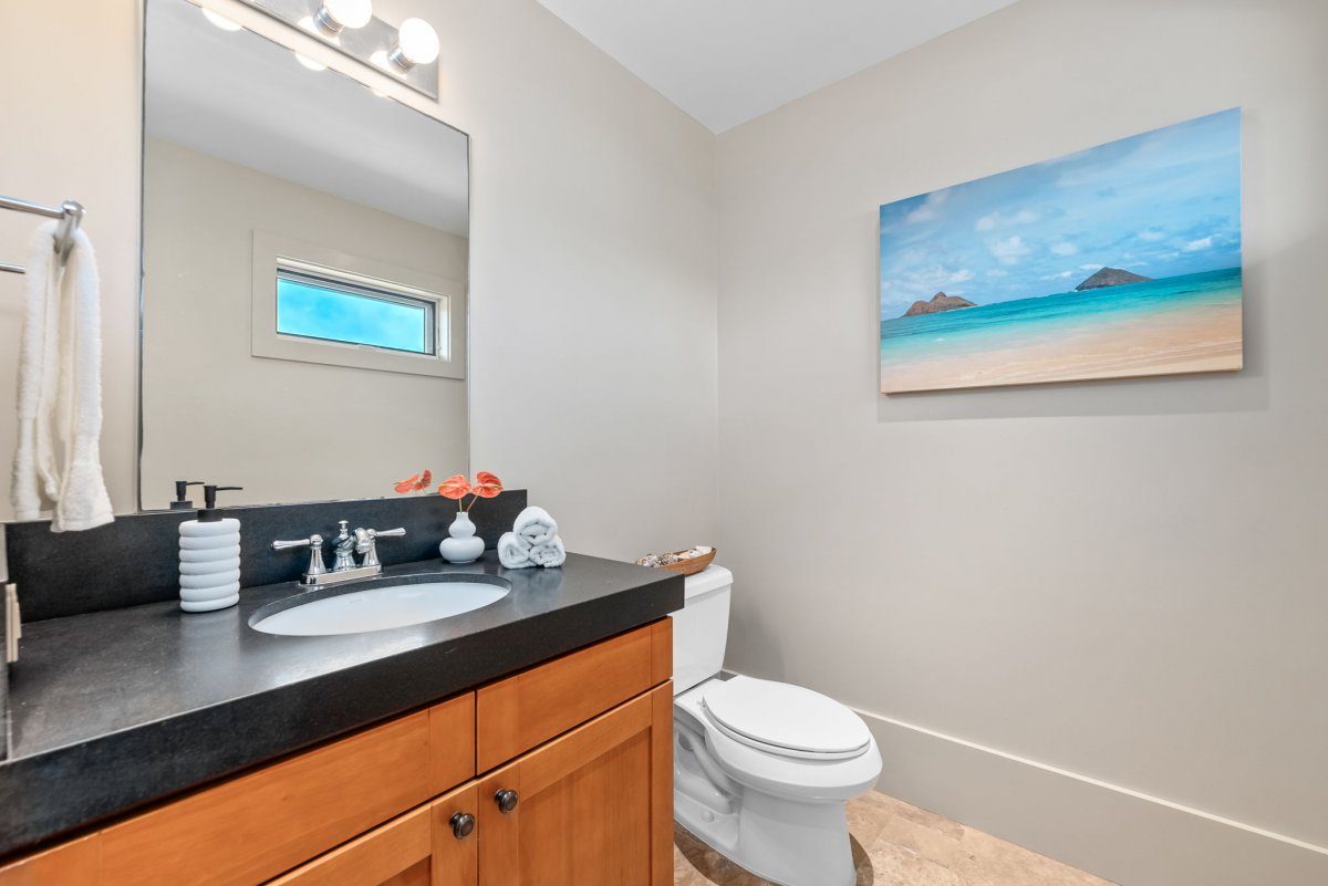 An ensuite bathroom with a single vanity.