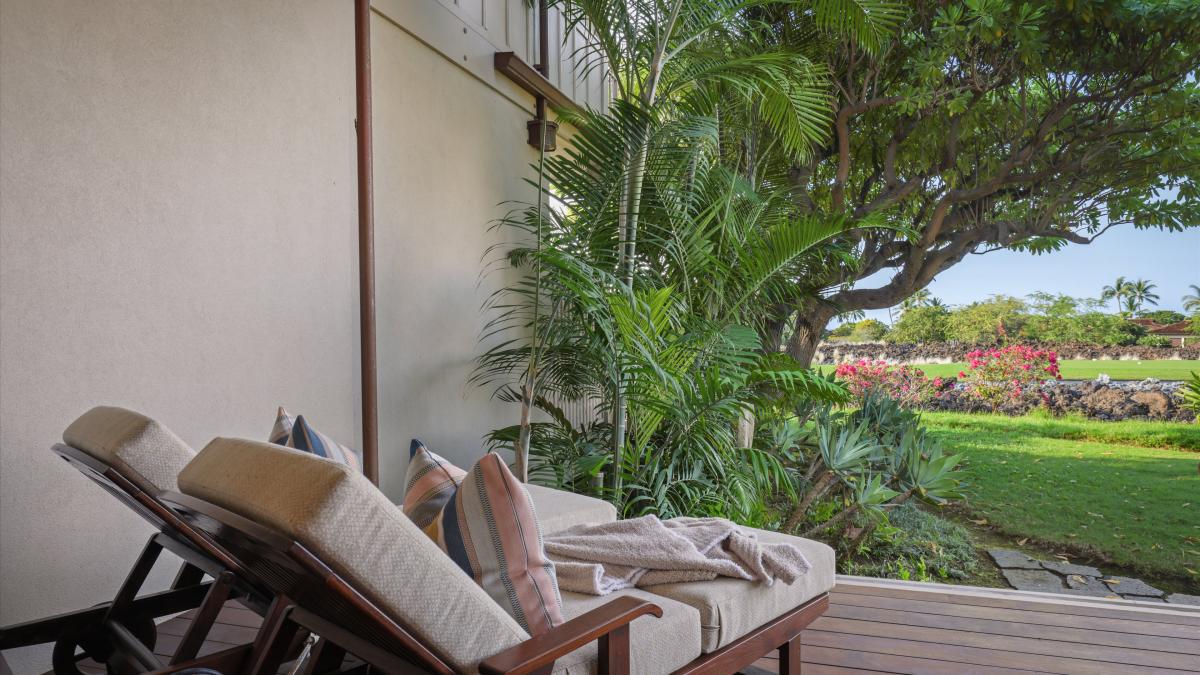 Lounge on the lanai with views of the golf course.