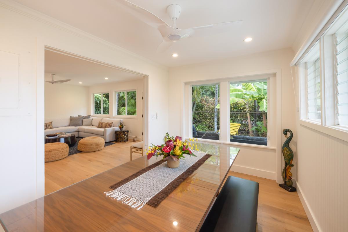 Open to the living room, the dining space keeps everyone connected even when they've drifted from the table.
