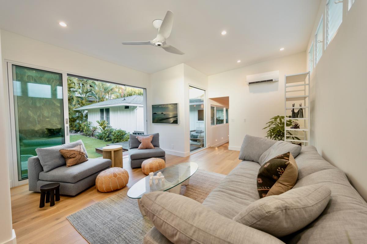 Roll back both glass walls and the recreation room joins the yard for the afternoon.