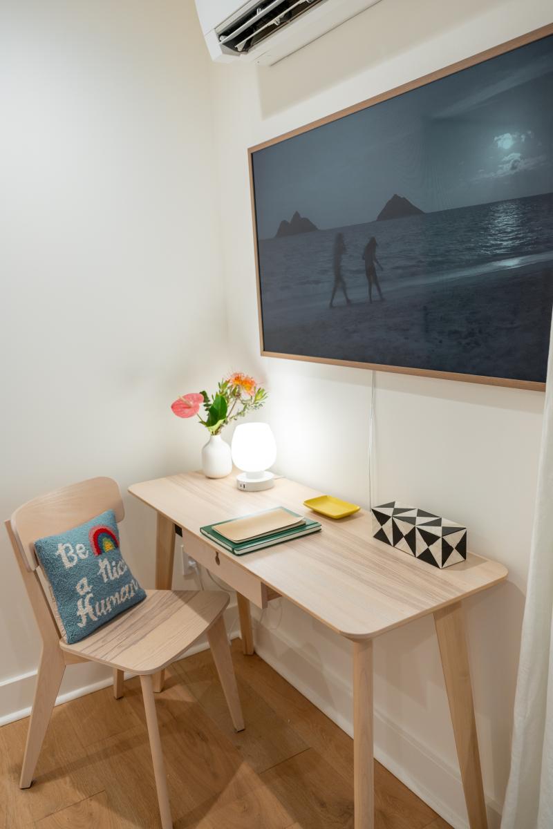 A quiet corner desk for the occasional check-in, then back to the beach.