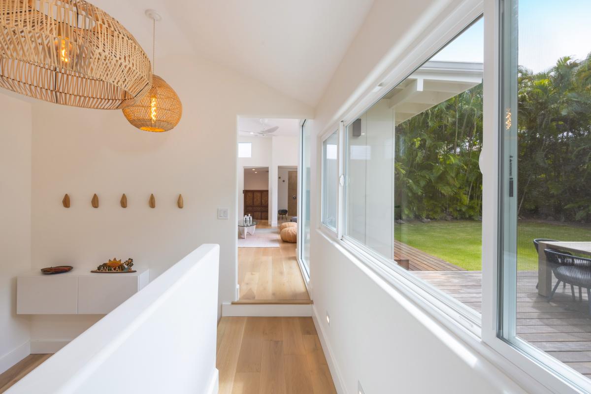 Even the hallway earns a pause with a full wall of glass that turns the walk to your room into a moment.