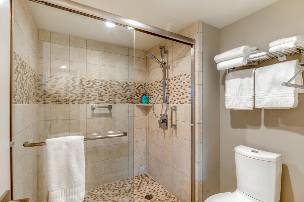 The ensuite bathroom has a separate walk-in shower.