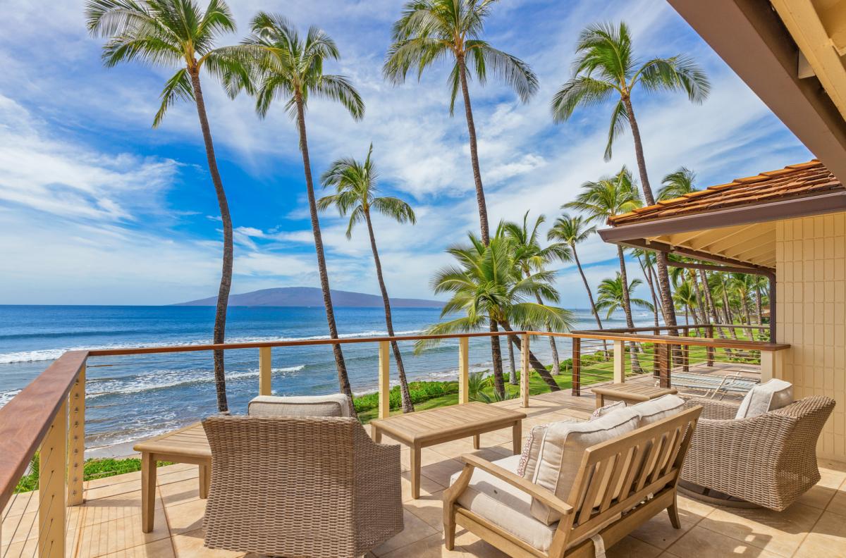 Unwind on the upstairs lanai, perfect for sunbathing, reading, or simply enjoying the ocean views.