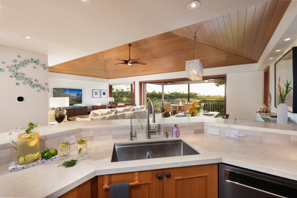 Modern kitchen with sleek appliances, ample counter space, and a spacious layout.