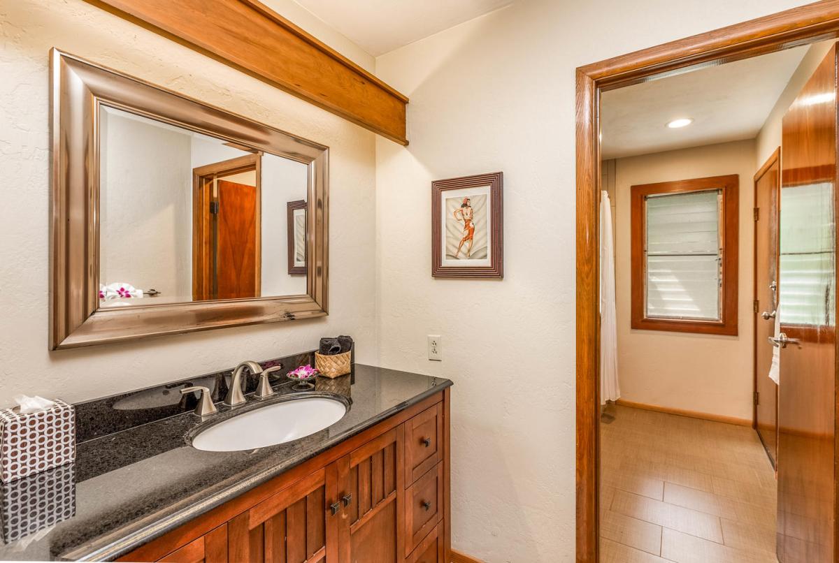 Bright and functional guest bathroom with elegant details and convenient layout.
