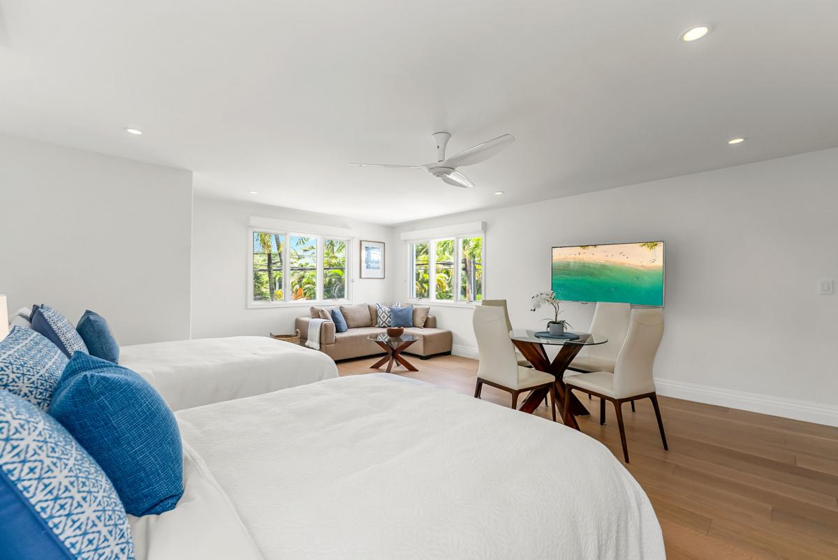 Comfortable layout with sleeping, lounging, and dining areas—all within steps of a private bath and wet bar.