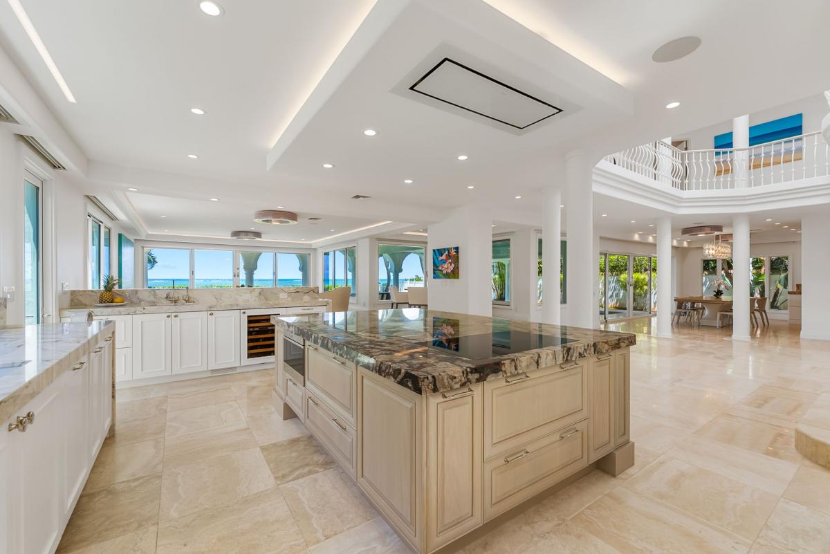 Bright and open kitchen with high-end appliances and stunning architectural details.