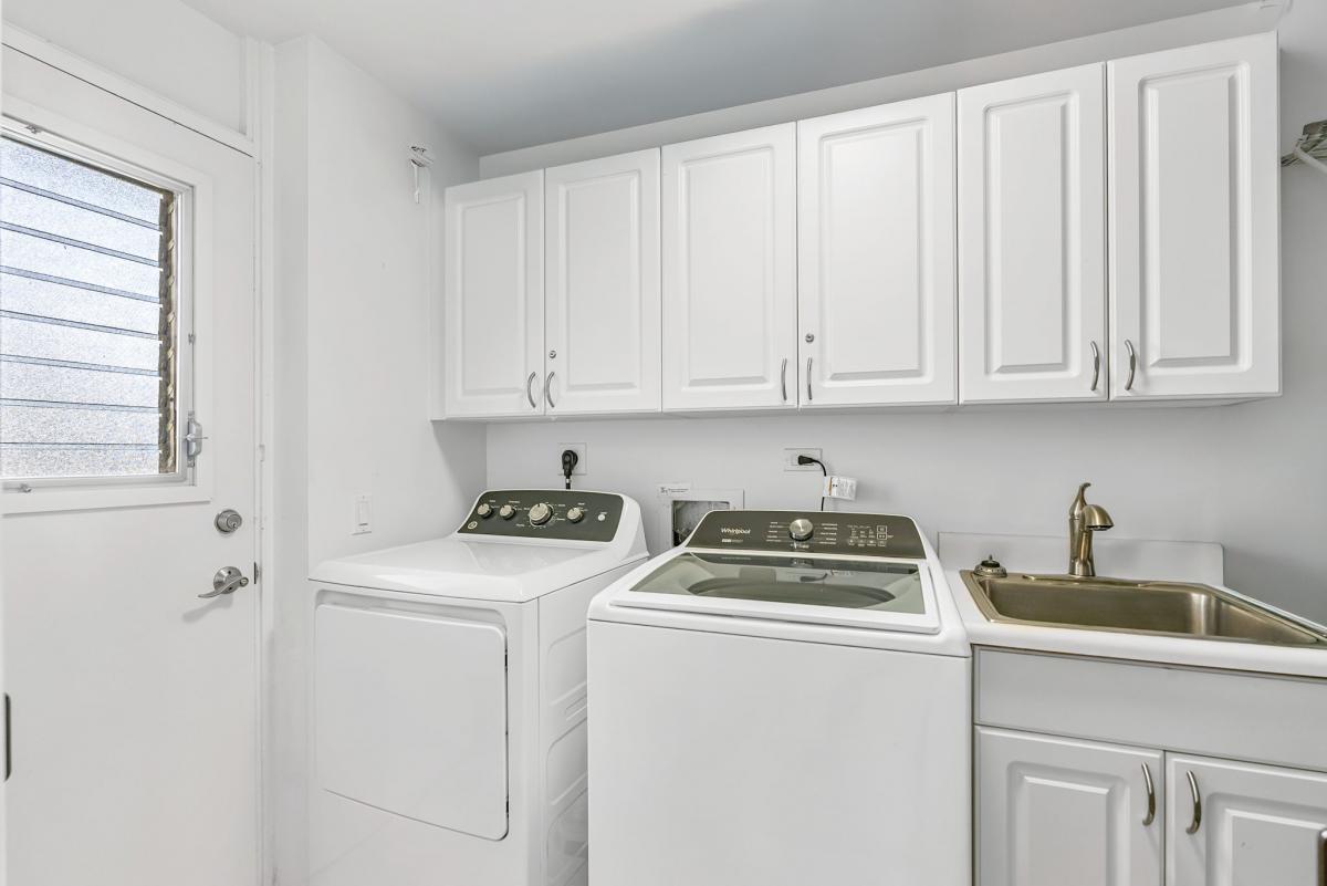 Dedicated laundry room with full-size washer and dryer—perfect for extended stays and added comfort.
