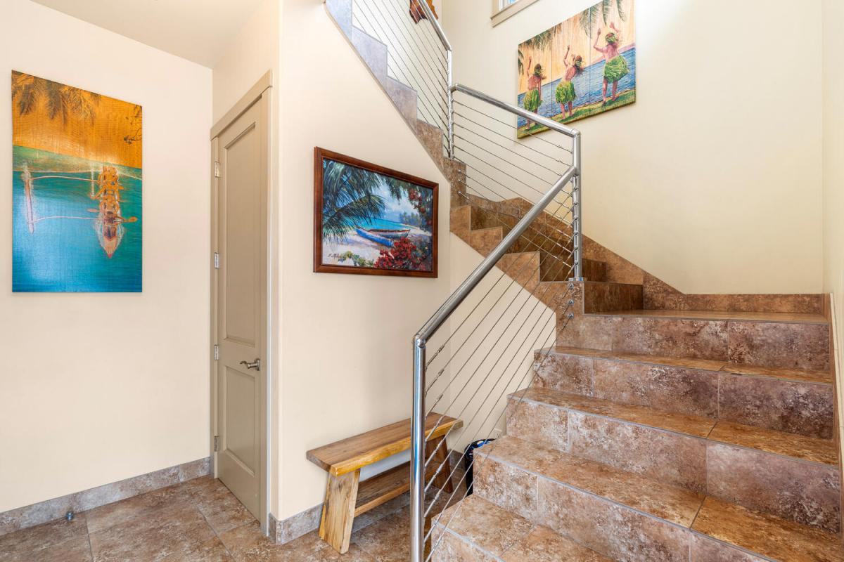 Local artwork lines the stairwell connecting all three levels, but an elevator stands by for beach-tired legs and effortless luggage transfers.