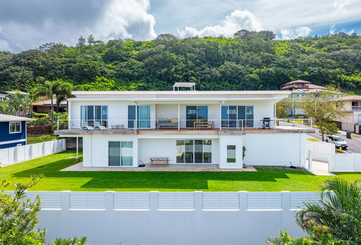 Gather with loved ones on the expansive lanai for dining and relaxation.