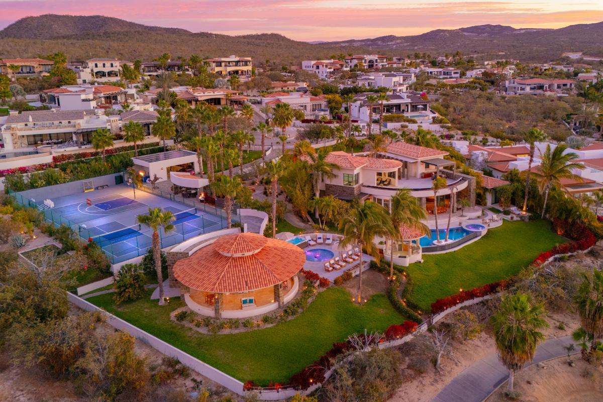 Bird's eye view of villa during sunset