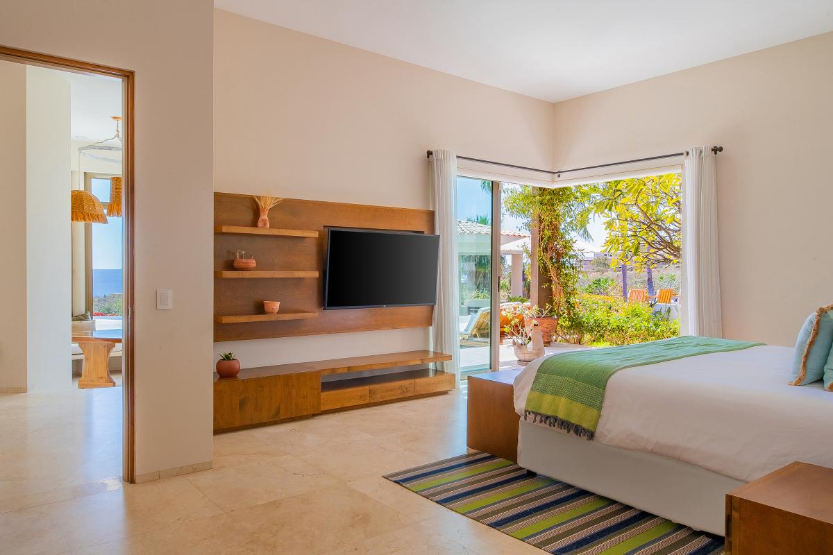 Bedroom suite with patio access