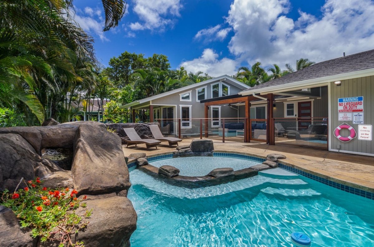 Lani Oasis welcomes you with a private saltwater pool framed by lava rock accents and tropical gardens, perfect for sunny afternoons in Princeville.