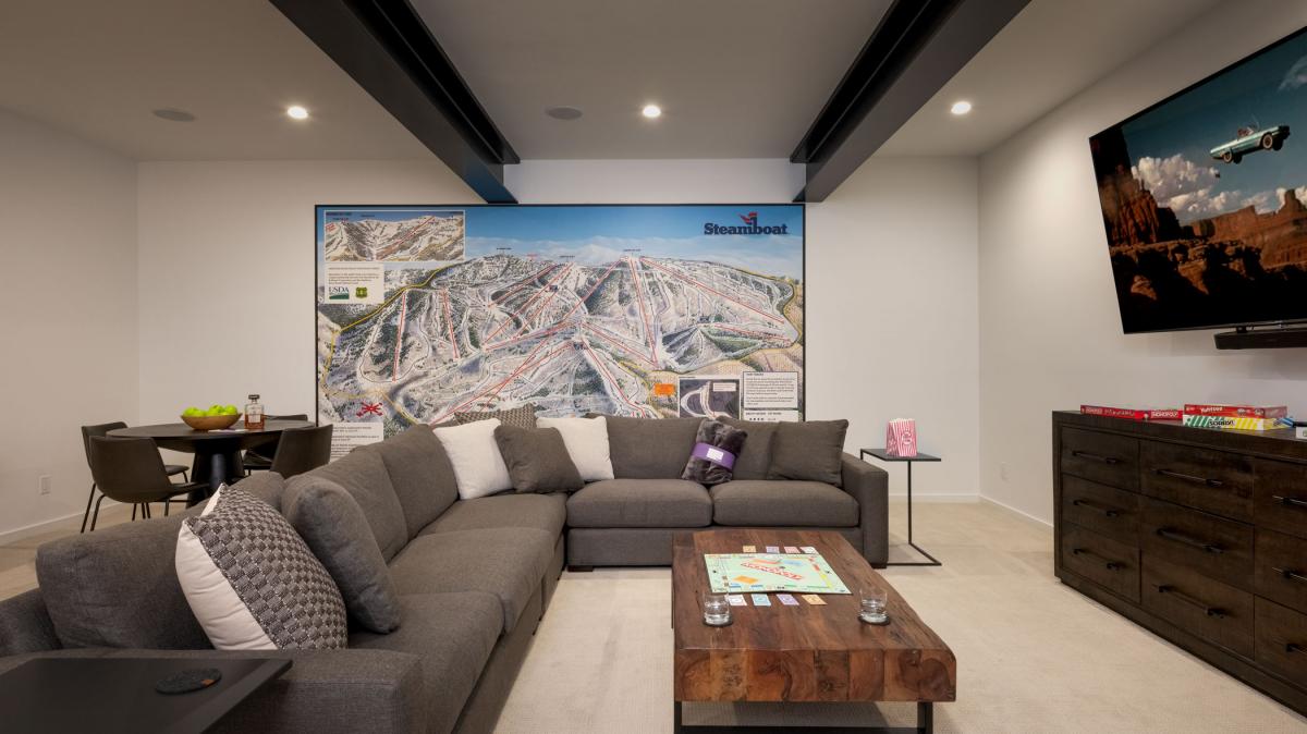 Spacious Entertainment Room, Lower Level - With custom large resort map