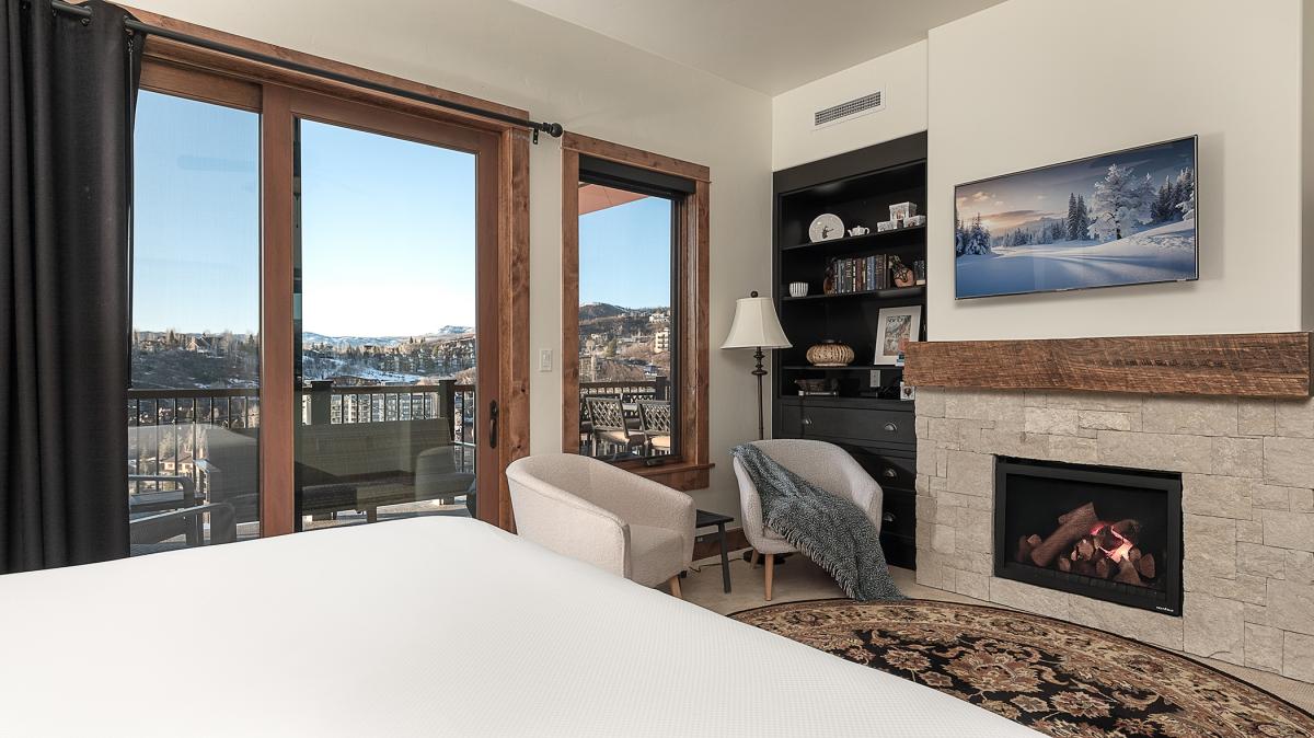 Bedroom 1, Main Level - Primary king suite fireplace