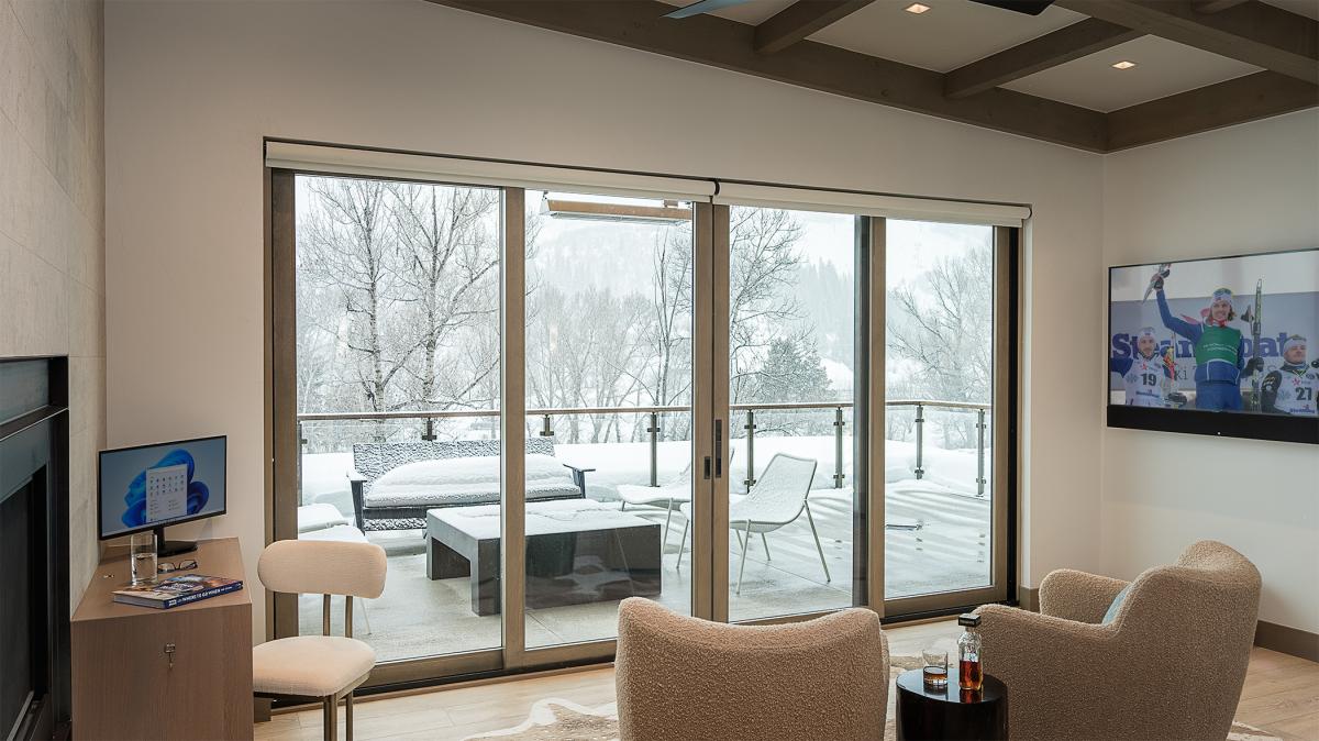 Bedroom 1, Upper Level - Primary king suite sitting area with upper patio views