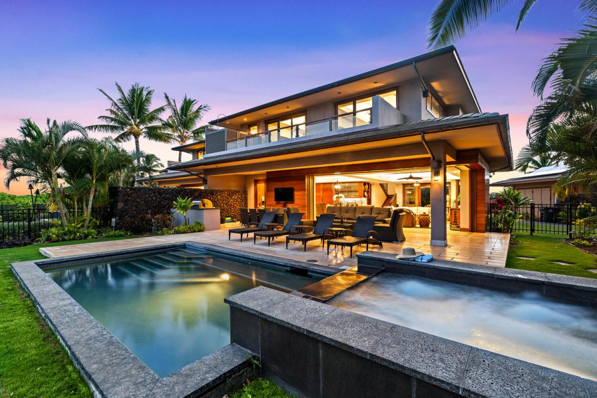 Sunset over your private pool and spa at this luxury island escape.