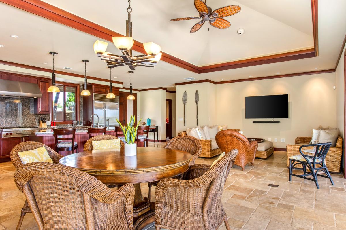 Gather for meals in the spacious dining area with seating for five and seamless flow to the lanai.