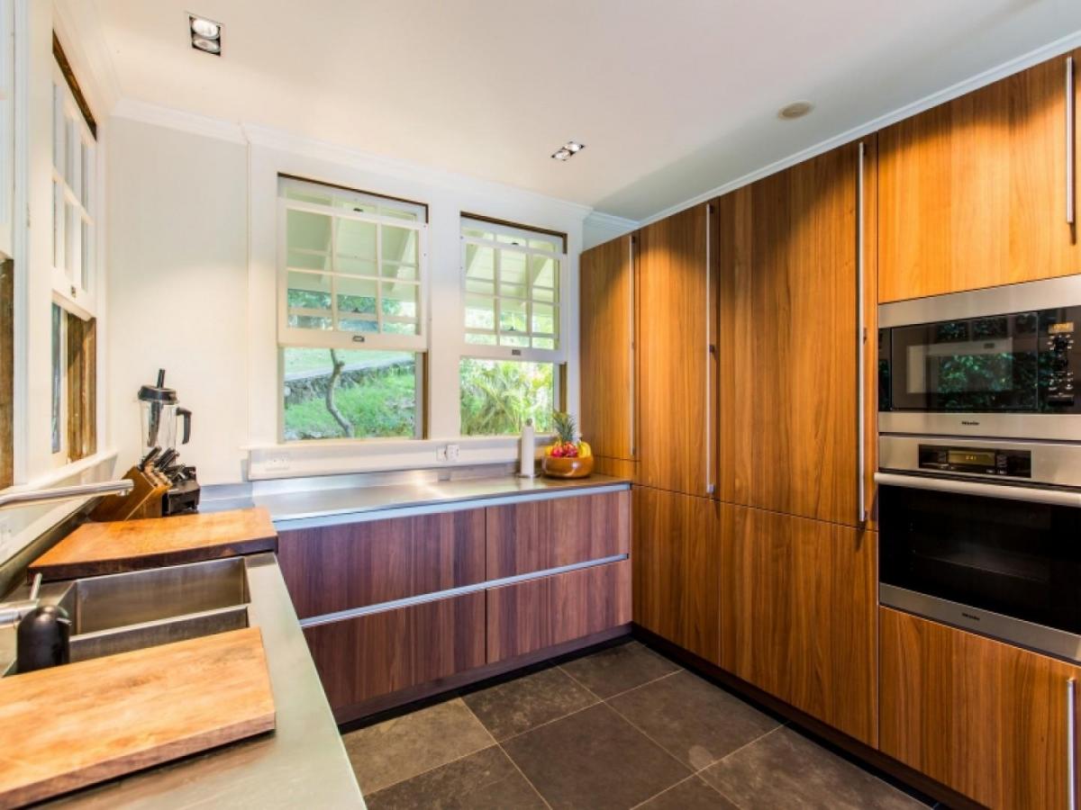 Sleek SieMatic cabinetry from Germany paired with modern appliances.