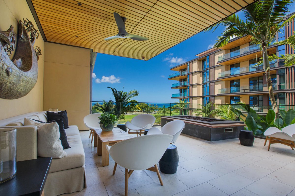 Beckons with ocean views, modern comfort, and tropical breezes through stylish seating areas.