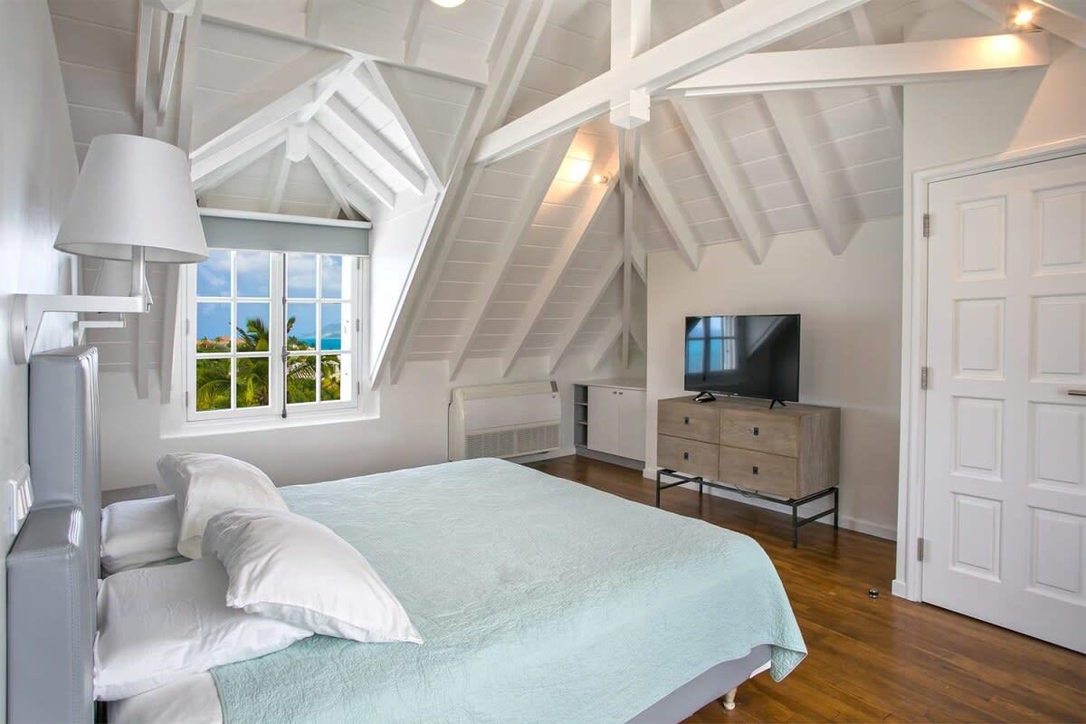 Bedroom upstairs (connected through interior)