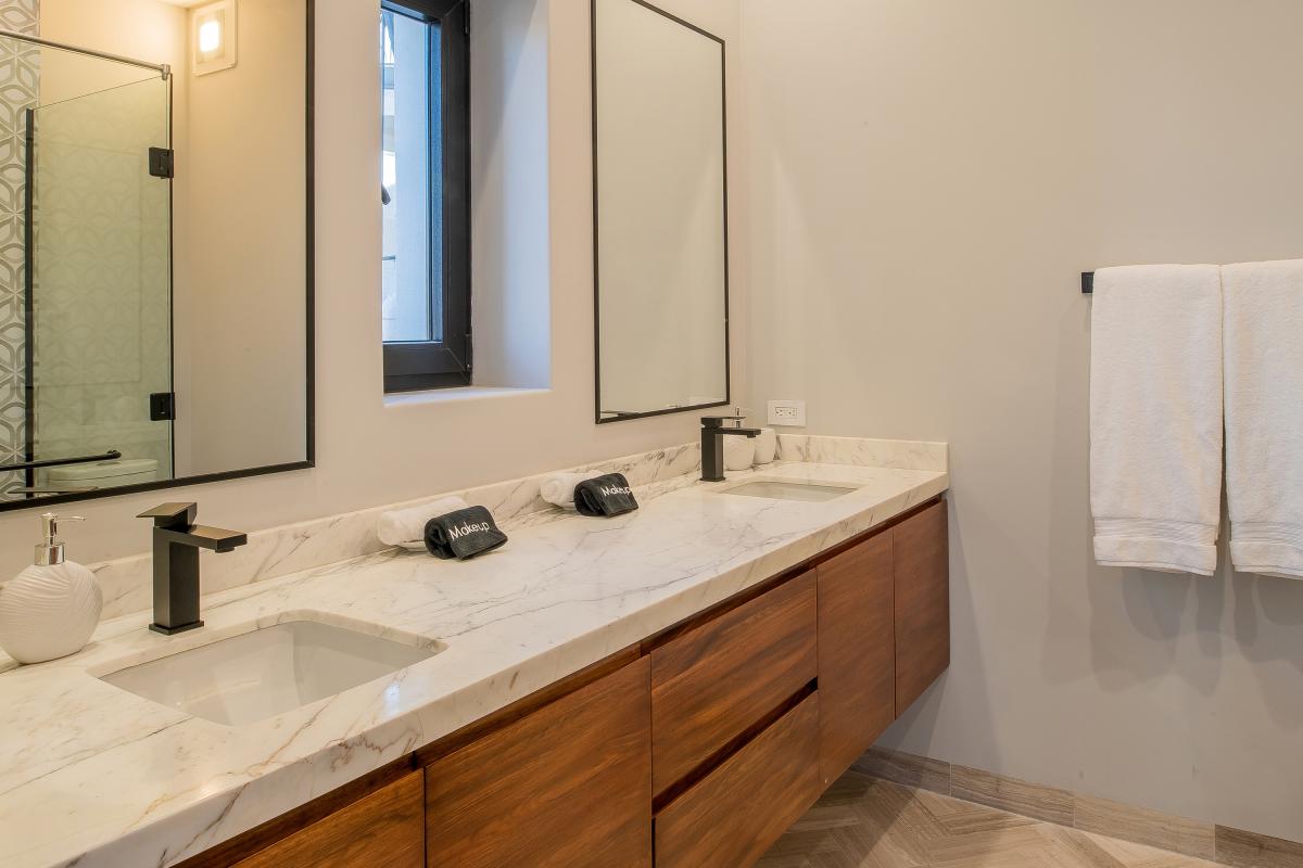 En suite bathroom with double sink