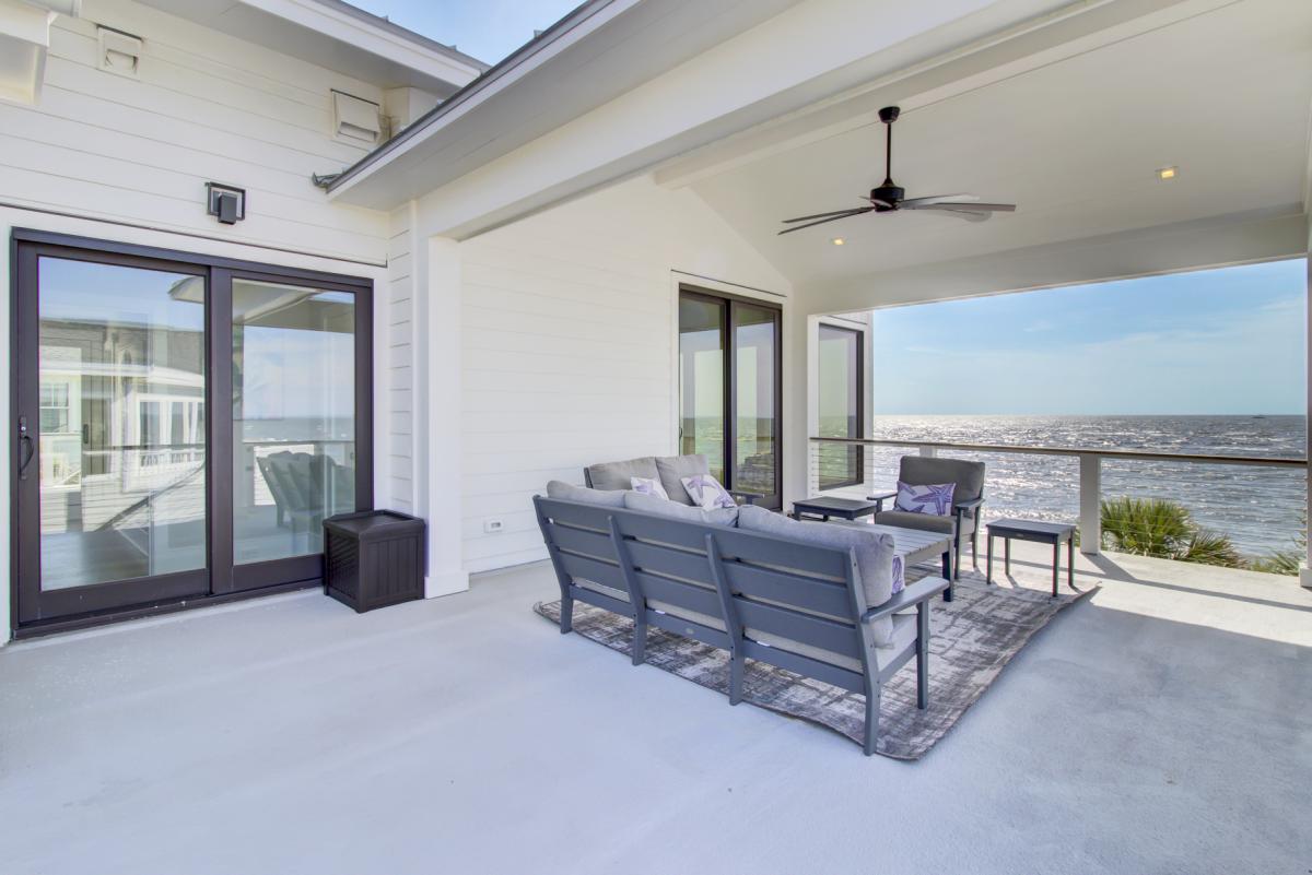 - Start your mornings with coffee and crashing waves right from this coastal perch - Plush seating and a ceiling fan set the mood for lazy afternoons or late night chats - Soak in those ocean views without ever leaving your private retreat
