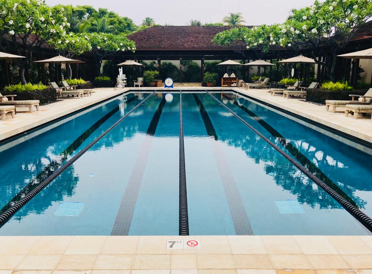 Take your morning swim in this pristine lap pool, surrounded by lush gardens and loungers for post-workout relaxation.