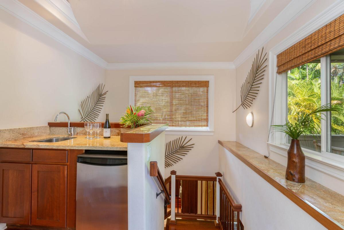 Wet bar area located upstairs.