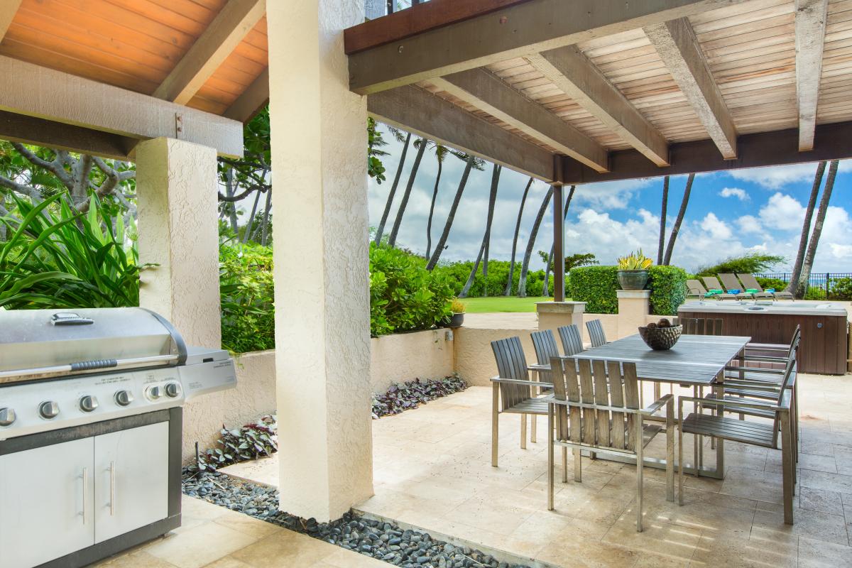 Fire up the grill and enjoy open-air dining beneath the shaded oceanview lanai.