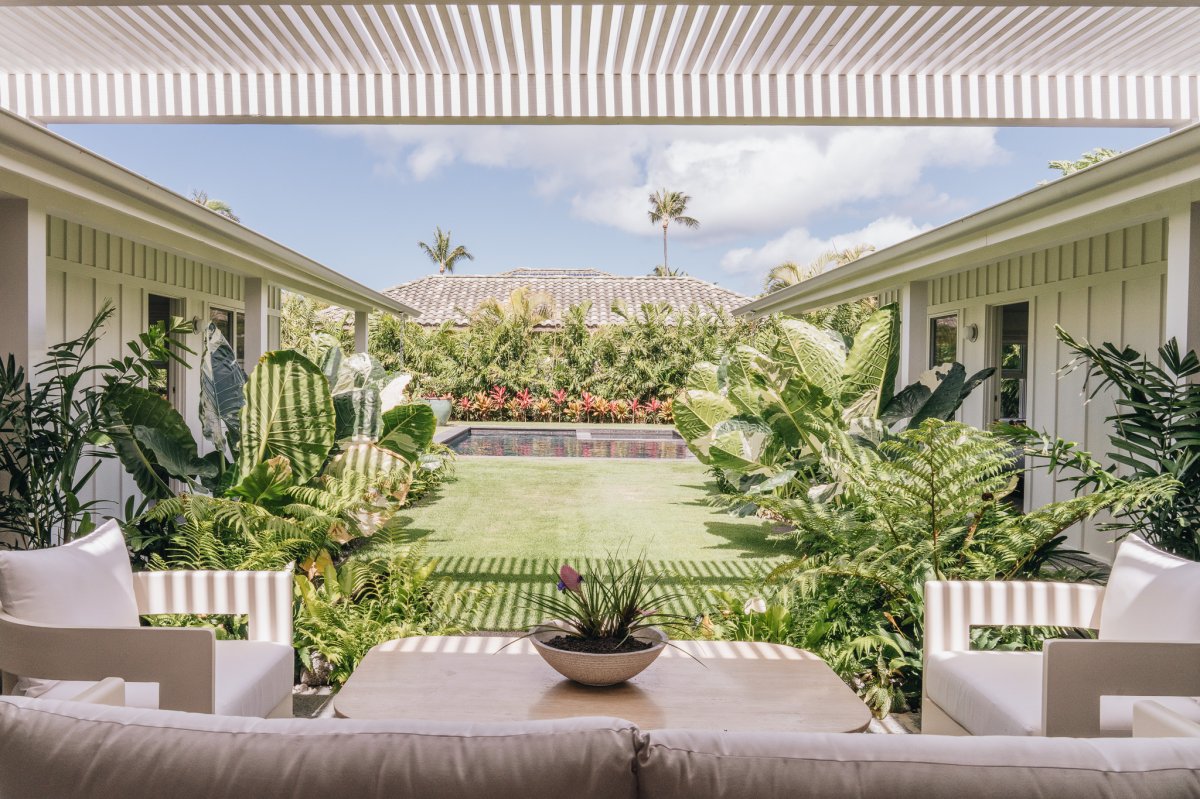 Start your day surrounded by tropical greenery in this peaceful garden retreat.