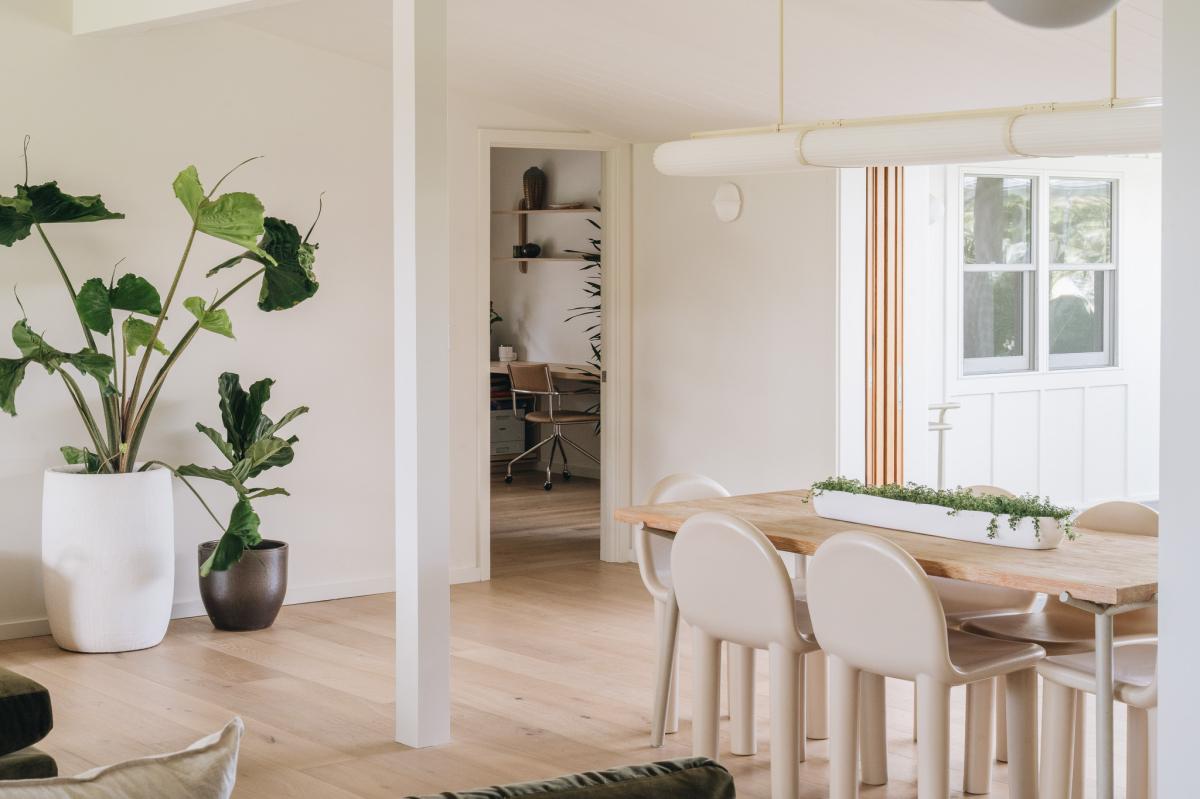 Gather for morning coffee or evening meals in this bright and welcoming dining space.