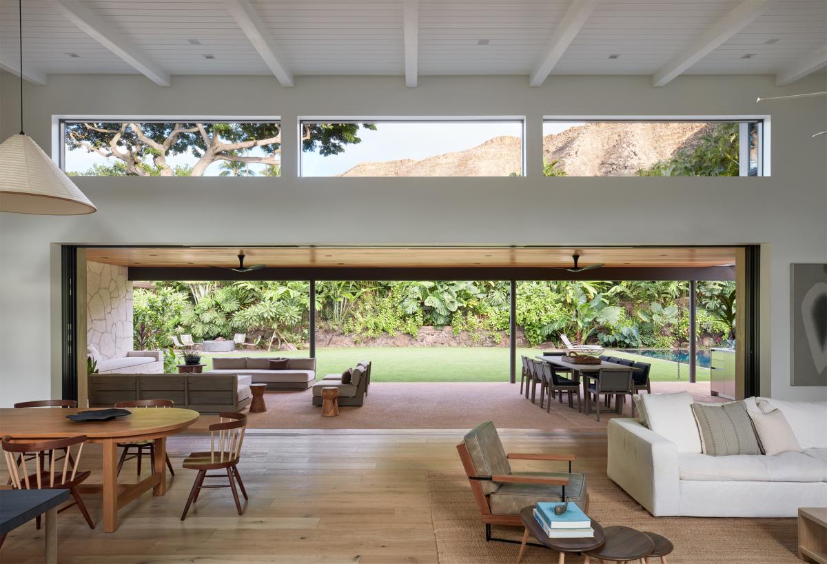 Open the wall of glass and let island living take over. The great room flows seamlessly onto the lanai and tropical gardens beyond.