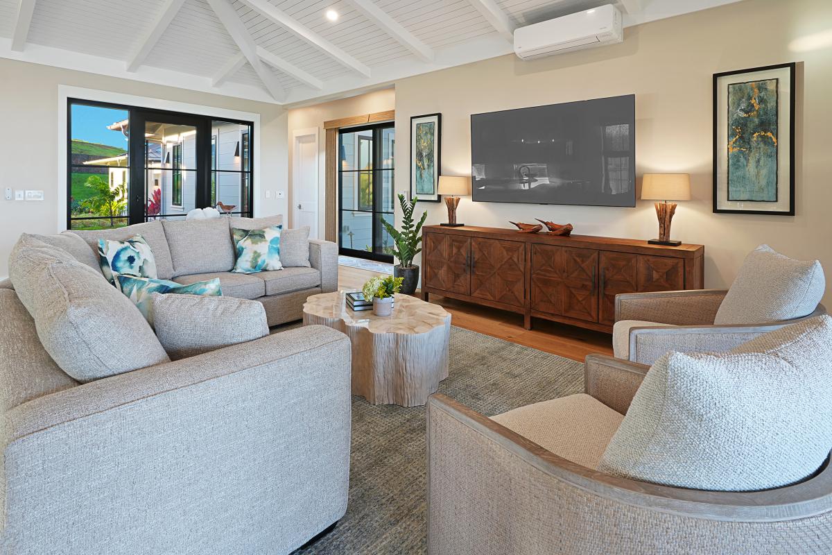 Wood floors, warm light, and room to spread out without losing the easy center of the house.
