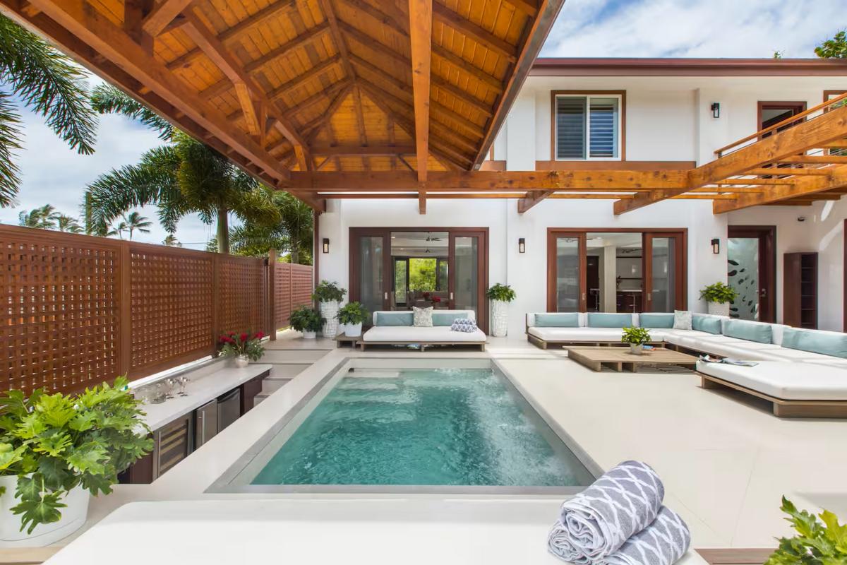 Towels set out and the pool waiting, the guest house deck is ready before you are.