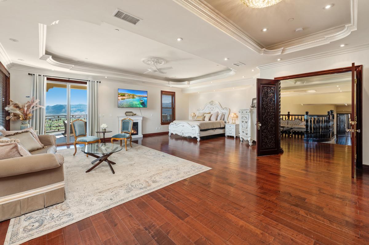The guest bedroom with a living space stretches out here, room to drift from one seat to the next.