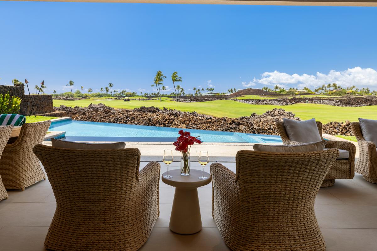 Unwind from the lanai with peaceful views of the pool and fairway beyond.