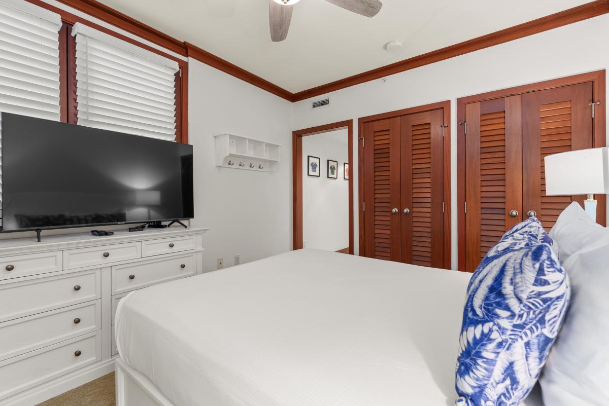 A TV across from the bed for the nights the beach wins and you stay in.